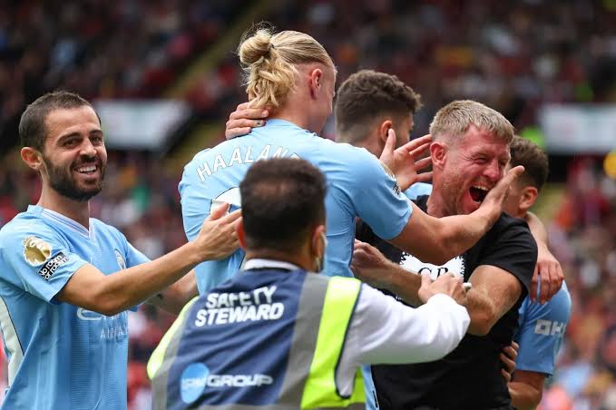 Erling Haaland with a City fan