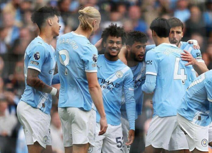 Erling Haaland and Manchester City teammates