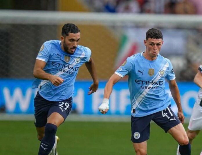 Rayan Cherki and Phil Foden