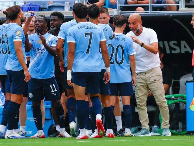 Pep Guardiola and Manchester City players
