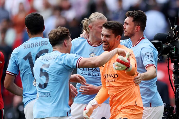 Stefan Ortega and City teammates