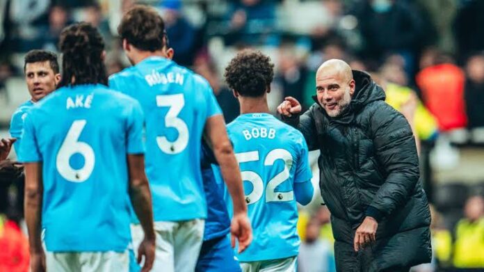 Pep Guardiola and Man City players