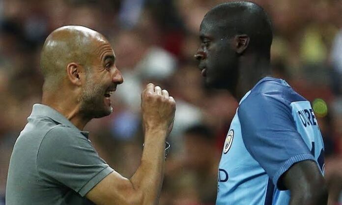Pep Guardiola and Yaya Toure