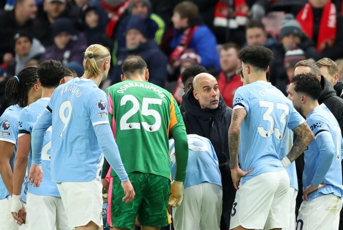Pep Guardiola giving instructions to Manchester City players