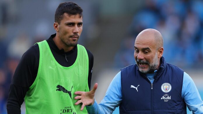 Rodri and Pep Guardiola