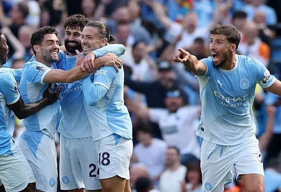 Man City players celebrate