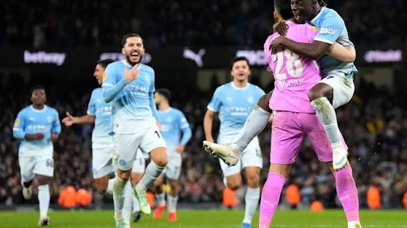 Man City players celebrate